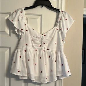 White Ruffled Top with Red Cherry Accents